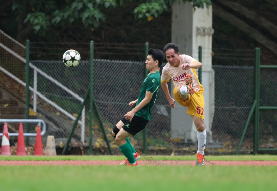 Players from both teams compete hard during the game.